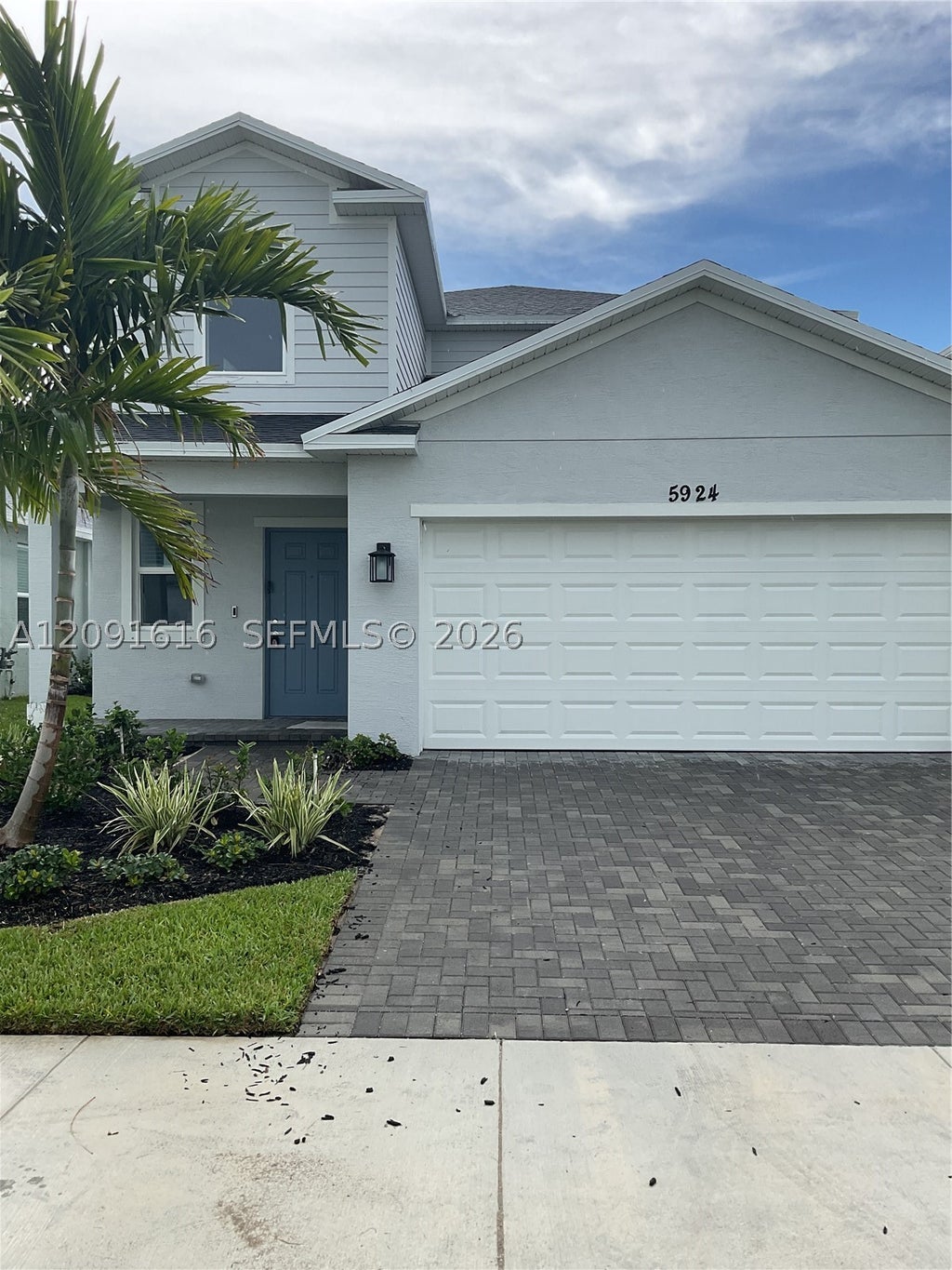 Photo of 5924 NW Fairfox Way, Port St Lucie, FL 34987 (MLS # A12091616)