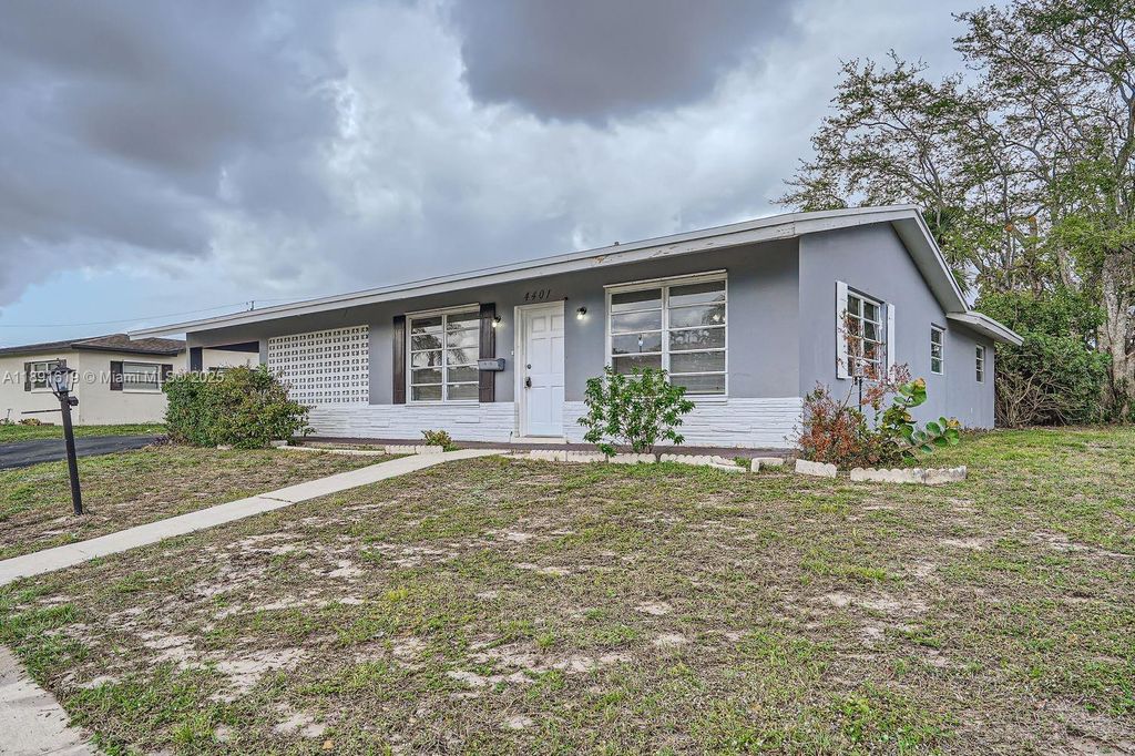 Photo of 4401 NW 6th Ct, Coconut Creek, FL 33066 (MLS # A11891619)