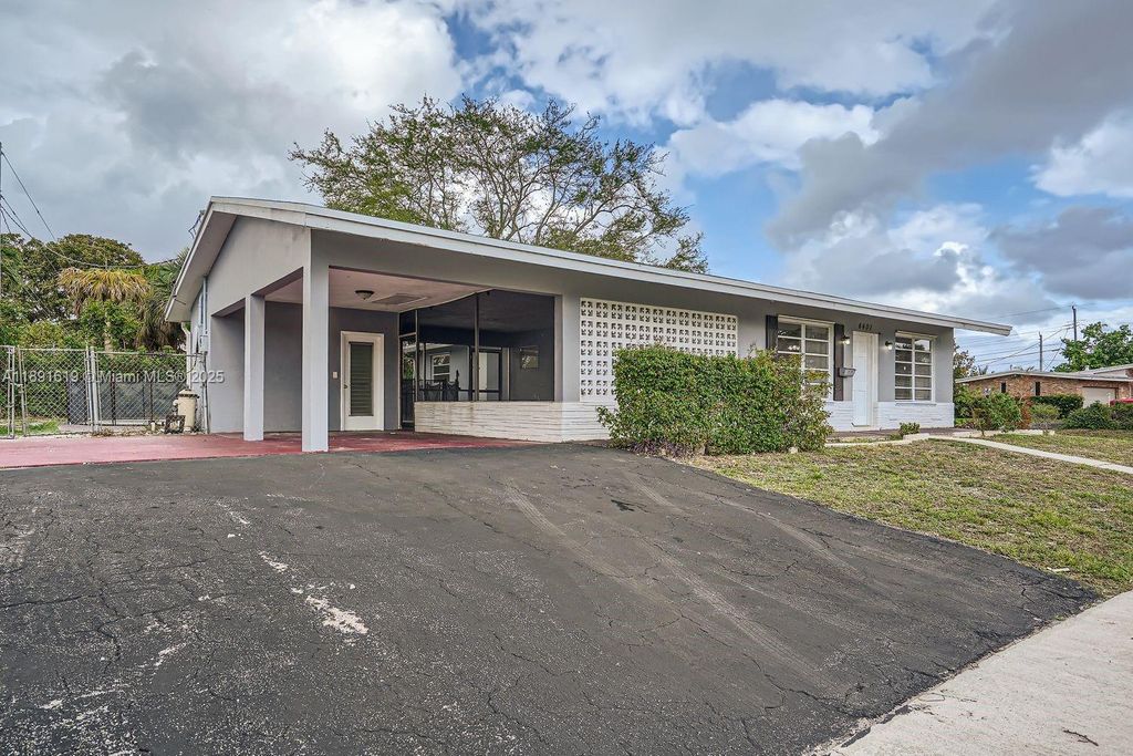 Photo of 4401 NW 6th Ct, Coconut Creek, FL 33066 (MLS # A11891619)