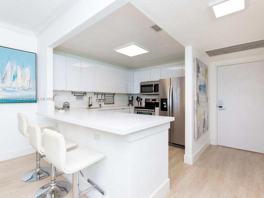 DIRECT OCEAN FRONT Large, newly renovated 1 bed, 1 bath residence with ocean views located inside South Beach’s trendiest oceanfront resort. Washer-dryer in unit. Electricity, cable, WiFi, water and valet with 1 parking spot included. Laundry room on every floor.Situated inside the same building as the luxurious 1 Hotel, Roney Palace residents enjoy the best of South Beach with access to 3 oceanfront swimming pools, a hot tub and beach service. Onsite restaurants include Aviv, STK South Beach, Plnthouse organic café, Watr at the Rooftop and more! Home to SoulCycle, Anatomy Gym, high-end spa, salon and retail fashion boutiques. Valet parking, full-time security, laundry on every floor, onsite management office.