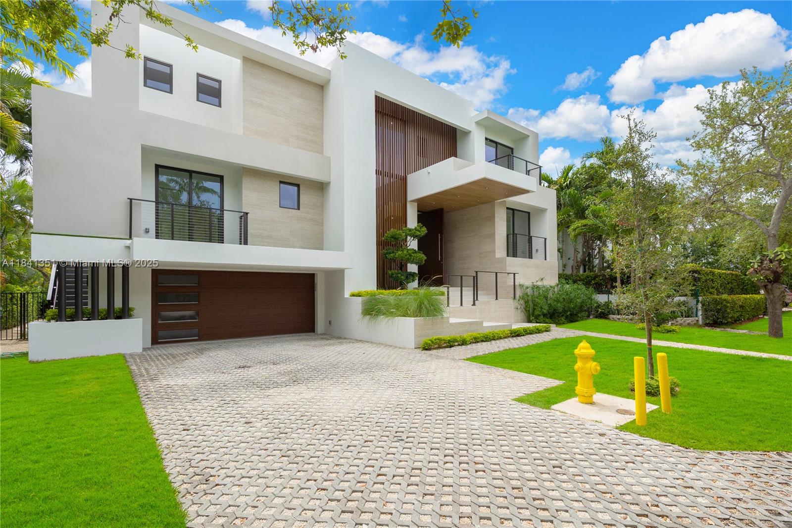 A rare architectural gem in Key Biscayne - only new construction pool home available ready to move in, built under the Village’s latest structural codes. This three-level residence is a study in minimalist sophistication, where natural light, clean lines, and premium materials converge in perfect harmony. A private elevator provides seamless access across all floors, while the Italian-designed kitchen, outfitted with Wolf and Sub-Zero appliances, balances form and function flawlessly. Private gardens, an enclosed street facing garage, and expansive interior volumes make this home ideal for refined living and elegant entertaining. Every detail has been curated to deliver a serene, secure, and elevated island lifestyle. This home is a statement of timeless modern living in KB.