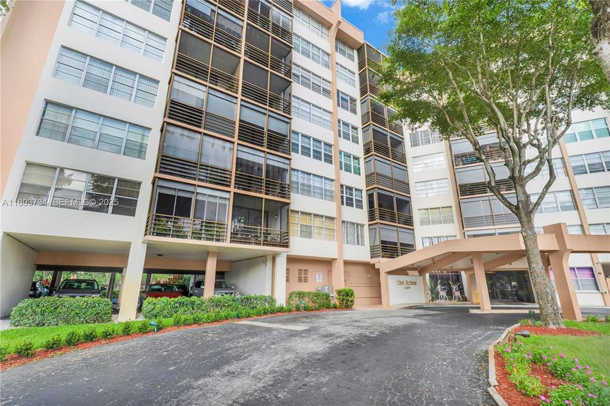 Don't miss this beautifully maintained ground floor corner unit located in the heart of Pembroke Pines in a desirable 55+ community. This spacious residence features a bright and airy living area with tile flooring throughout, a newer AC and water heater, and a generously sized master bedroom complete with a large walk-in closet. Relax on your private screened-in balcony and take in the stunning golf course views.  Enjoy resort-style living with community amenities including a guarded entry gate, sparkling pool, clubhouse, courtesy bus service, ample guest parking, and more. Centrally located with easy access to shopping, dining, and entertainment.  Schedule your showing today!