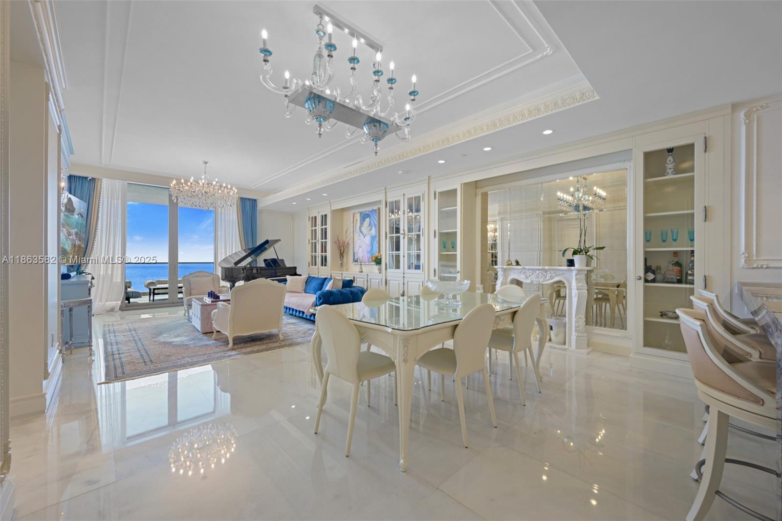 Experience luxury living at The Estates at Acqualina. This 4BD/5BA unit features a private foyer, gourmet kitchen with La Cornue gas range, and terraces with breathtaking ocean and Intracoastal views. Residents enjoy over 60,000 sq. ft. of amenities, including a private beach, state-of-the-art gym, world-class spa, five restaurants on the property, ice-skating rink, bowling, and Rolls-Royce house car service—all within one of Sunny Isles Beach’s most prestigious addresses. Conveniently located just 25 minutes from FLL and Executive airports.