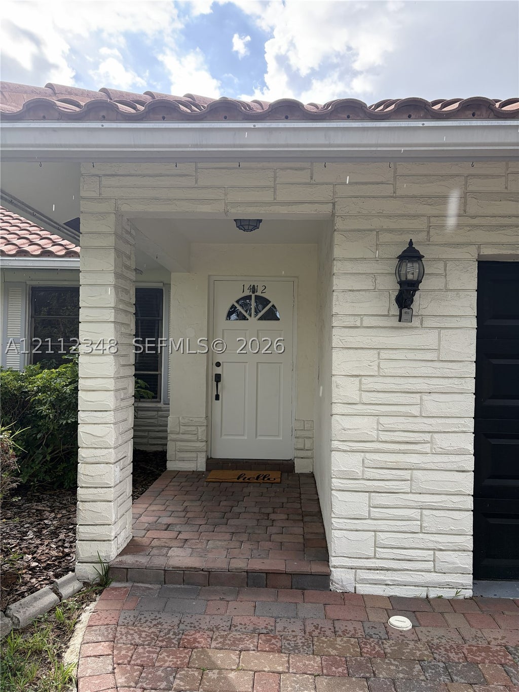 Photo of 1410-1412 NW 93rd Ter #1412, Coral Springs, FL 33071 (MLS # A12112348)