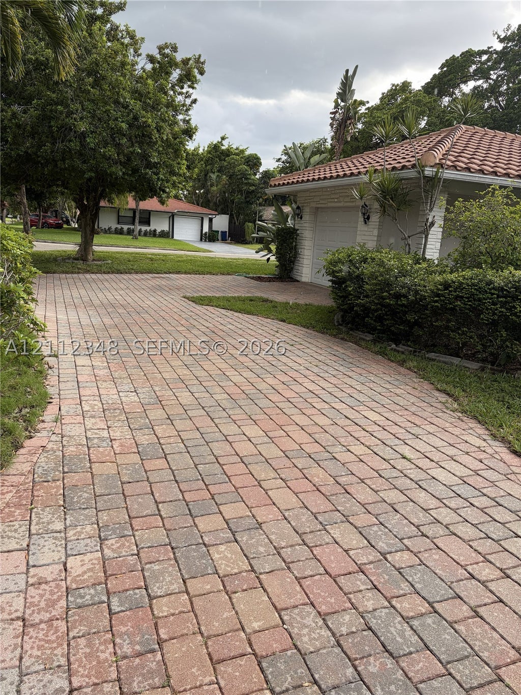 Photo of 1410-1412 NW 93rd Ter #1412, Coral Springs, FL 33071 (MLS # A12112348)