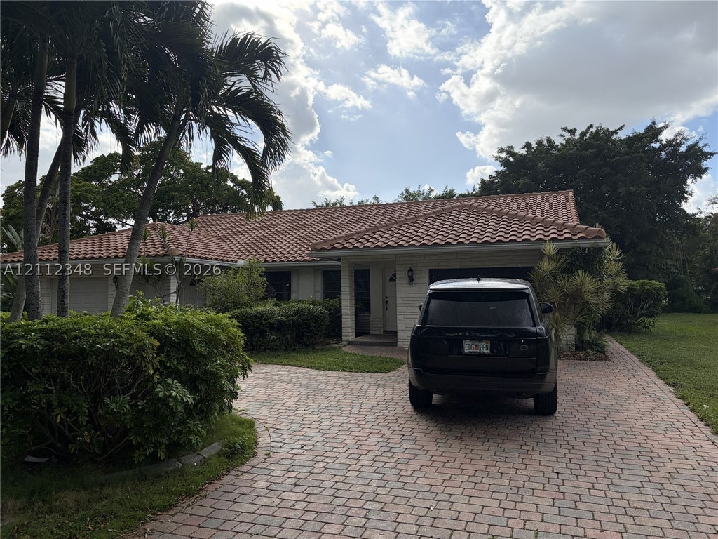 Photo of 1410-1412 NW 93rd Ter #1412, Coral Springs, FL 33071 (MLS # A12112348)