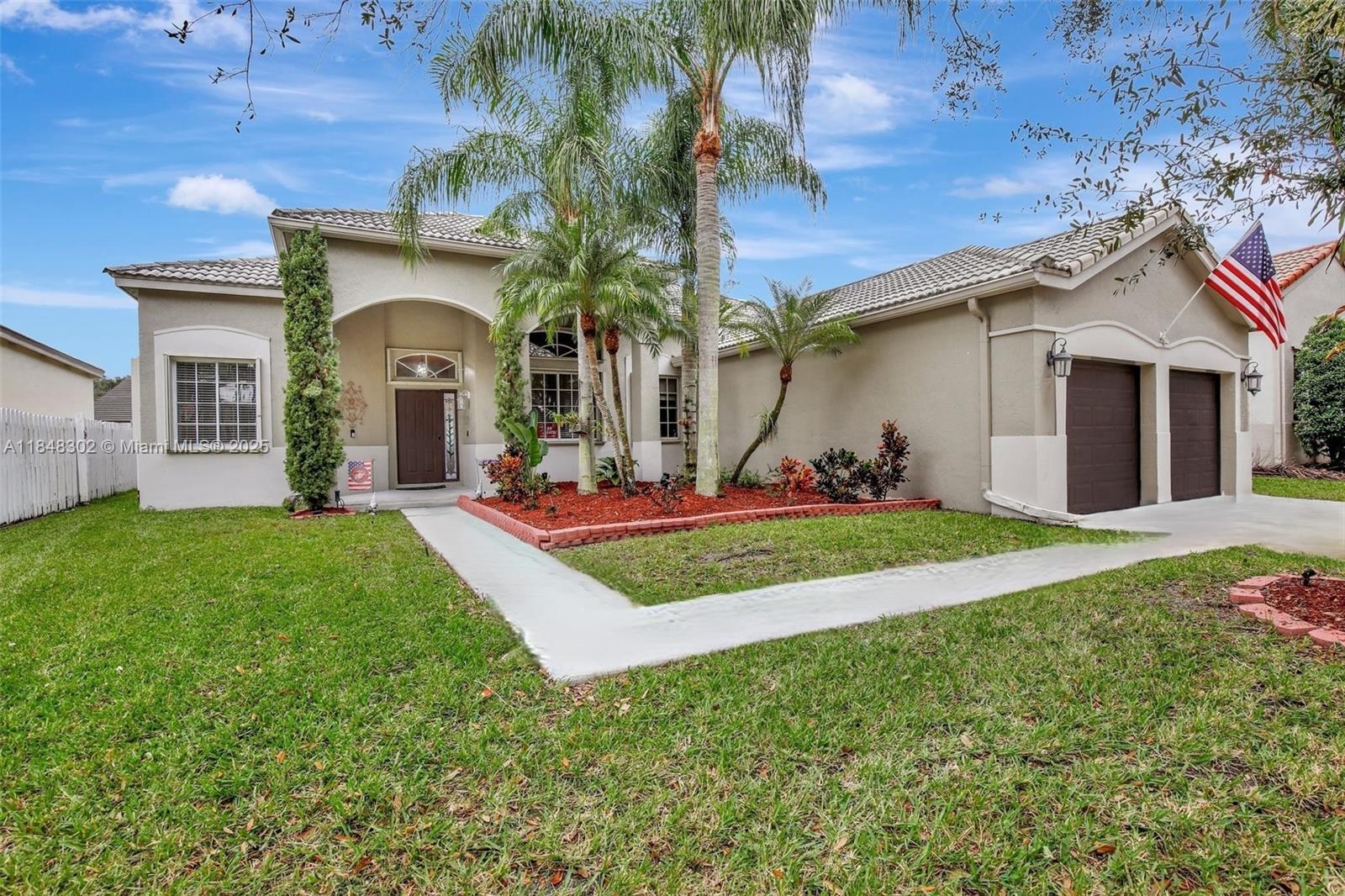 This beautifully maintained single-story home features 4 bedrooms and 2 updated bathrooms. Enjoy soaring ceilings, wood laminate flooring, and abundant natural light throughout. The kitchen boasts granite countertops, stainless steel appliances, and a cozy breakfast nook. Formal dining & living. The primary suite offers a tranquil retreat with a remodeled ensuite bath. Family room. Entertain in the fenced BIG backyard with a covered patio perfect for outdoor relaxation. Accordion hurricane shutters, smart sprinkler system, and Ring security cameras. Located within walking distance to A-rated Eagle Point Elementary and park, community pool, and minutes from shopping and major highways. A-Rated schools Don’t miss this opportunity to own in one of Weston most desirable neighborhoods!