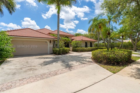Photo of 1051 Deerpath Ct, Weston, FL 33326 (MLS # A12064813)