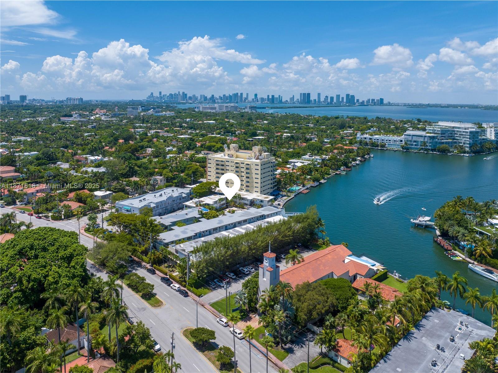 Pretty Pine Tree Dr! Chic 1BD/1BA waterfront beach pad with tasteful renovations, sun-filled interiors, remodeled bathrooms, & an open gas kitchen. Enjoy access to a spacious pool, lush gardens, & gorgeous canal & sunset views. Prime location near nightlife, top dining, great schools, beaches, parks, & more!