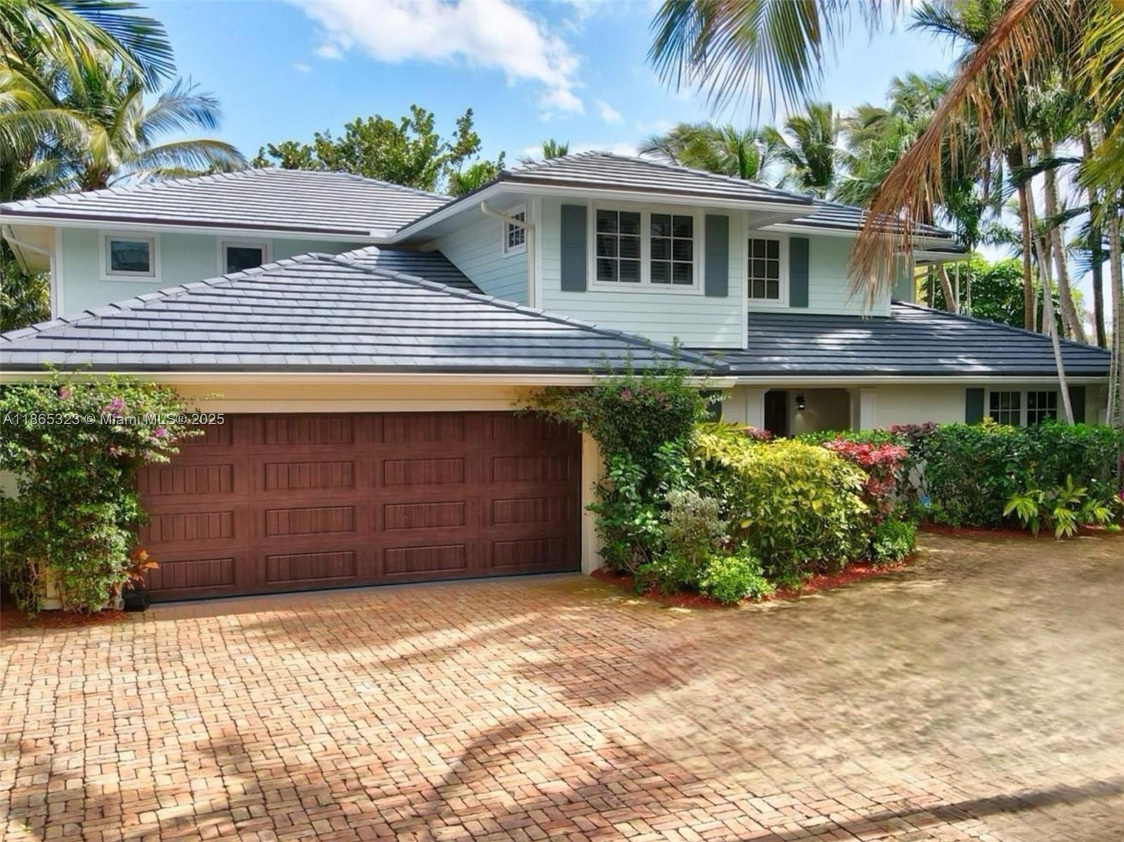 Rarely available golf course + beachside retreat! This 5 bed / 4 bath home in East Boca’s coveted Sun & Surf is one of only 16 backing Red Reef Executive Golf Course—just steps from the sand. Nestled on an oversized cul-de-sac lot off A1A, it offers unmatched privacy and luxury. Remodeled in 2017 and enhanced in 2022 with impact windows, vaulted ceilings, Calacatta marble, Wolf & Sub-Zero appliances. Two bedrooms down, three up—including a master suite with coffee bar, custom closets, and spa-inspired bath. Outside: tropical gardens, expansive patios, and a heated pool + spa create the ultimate Boca lifestyle.