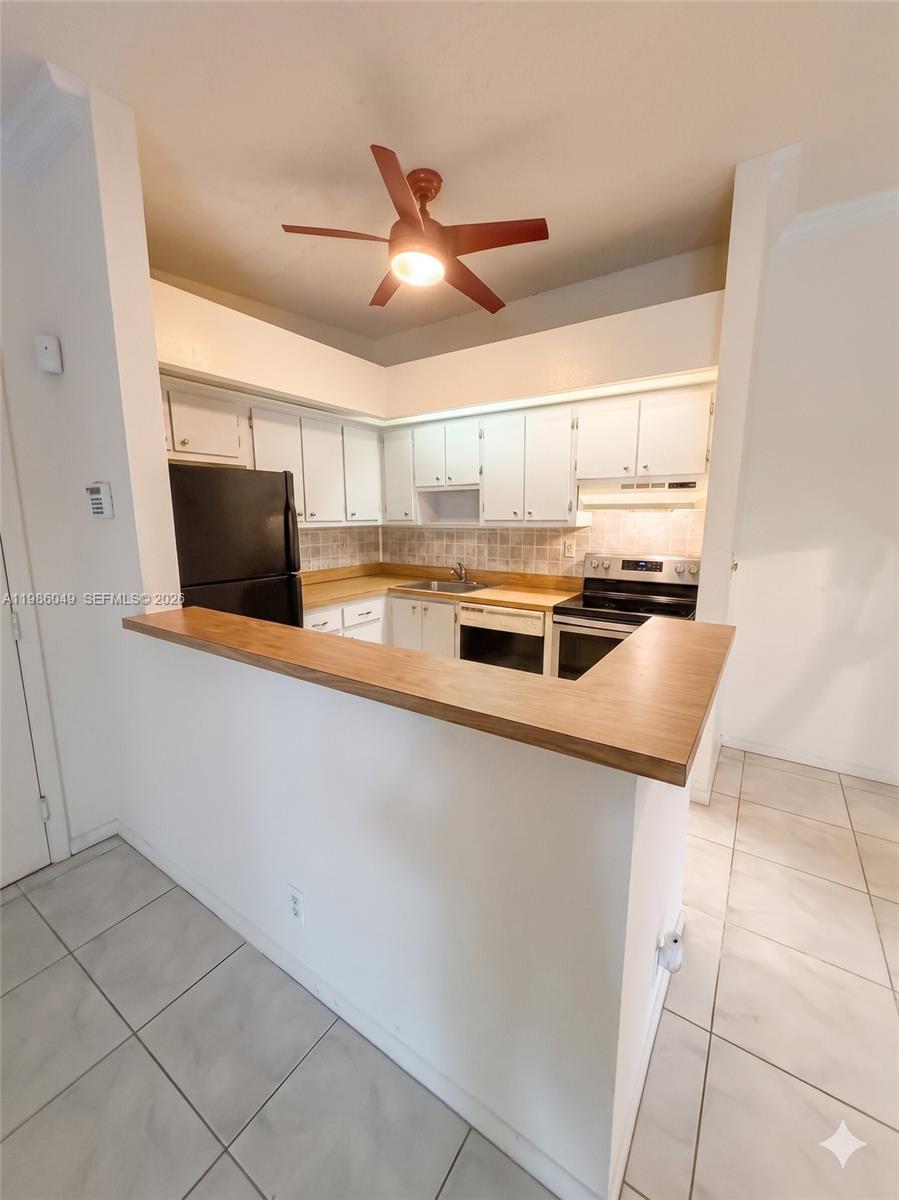 Photo of 15500 Lakes Of Delray Blvd #207, Delray Beach, FL 33484 (MLS # A11986049)