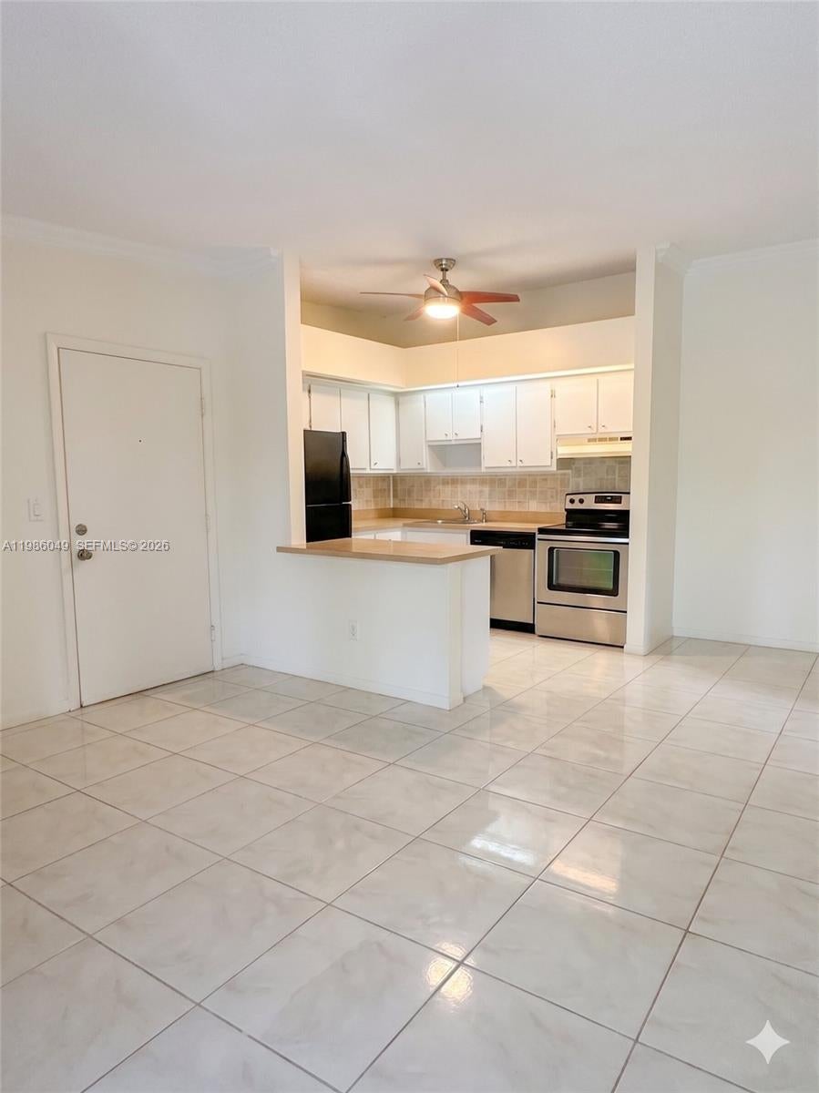 Photo of 15500 Lakes Of Delray Blvd #207, Delray Beach, FL 33484 (MLS # A11986049)