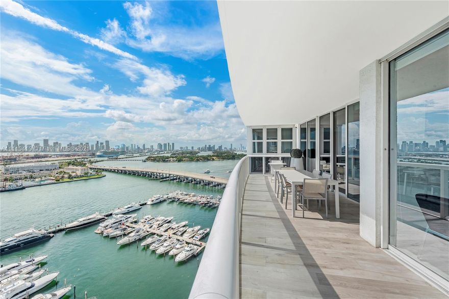 Most desirable line in the exquisite SOFI Murano Grande 3 Bed 3.5 Bath with spectacular Sunrise & Sunset views in this flow-through East/West unit with panoramic views of the fabulous skyline. No expense was spared with SubZero & Meile Appliances, with an open kitchen concept. Formal & informal dining areas to entertain. Meticulously renovated to perfection.  Have a morning cup of coffee/tea or morning yoga on your large terrace facing the Atlantic Ocean to the East or a dinner with friends on the Westside expansive balcony facing the Iconic downtown views. A must-see. Murano Grande at Portofino is a full-service condominium w/ a tennis court, a full-service gym/massage room, & a newly renovated pool restaurant & full-service expansive pool deck facing the marina and Biscayne Bay. See Now!