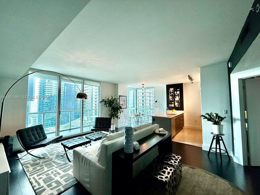 Spectacular High-Floor 2/2 Fully Furnished Corner Unit! Professionally decorated. Enjoy breathtaking skyline and Miami River views from this stunning residence featuring designer finishes, wood floors, and a modern Italian kitchen. The building offers 5-star amenities, including a rooftop pool and concierge service. Must-see unit! Easy to show—bring all offers.
