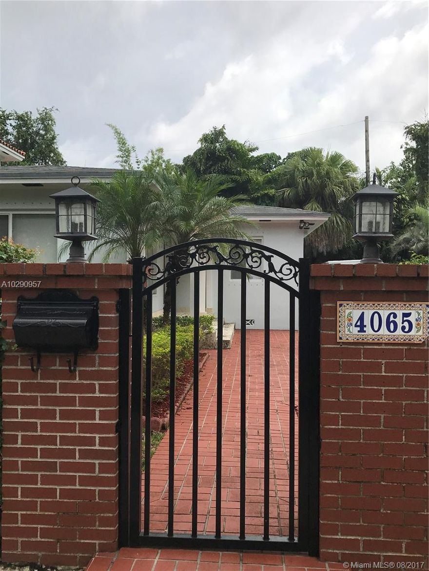 Beautiful South Grove Home. Walking distance to Merry Christmas Park, Cocowalk shops and restaurants.
Enjoy all the beauty and charm of the Grove in this ready to move in 2 Bedroom / 2 Bath home.
Gated home with circular driveway and electric gate.Shed for extra storage.  
Actual area 1,148 sqf
Adjusted Area 1,091 sqf