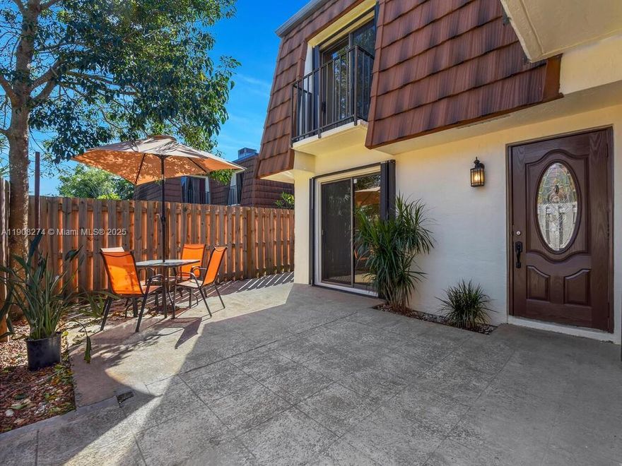 Discover the perfect blend of comfort, style, and convenience in this rarely available 3-bedroom, 2.5-bath townhome nestled within the desirable Hamlet community. Step inside to find a freshly painted interior with a bright, open layout featuring tile flooring on the first level and newer carpet upstairs. The beautifully updated kitchen boasts sleek stainless steel appliances, modern cabinetry, and ample counter space. Upstairs, spacious bedrooms offer private balconies that invite natural light and gentle breezes. Enjoy outdoor living in your own private courtyard, perfect for relaxing or dining al fresco. This home sits in a prime location within the community, just steps from the sparkling pool and conveniently close to the mailboxes.