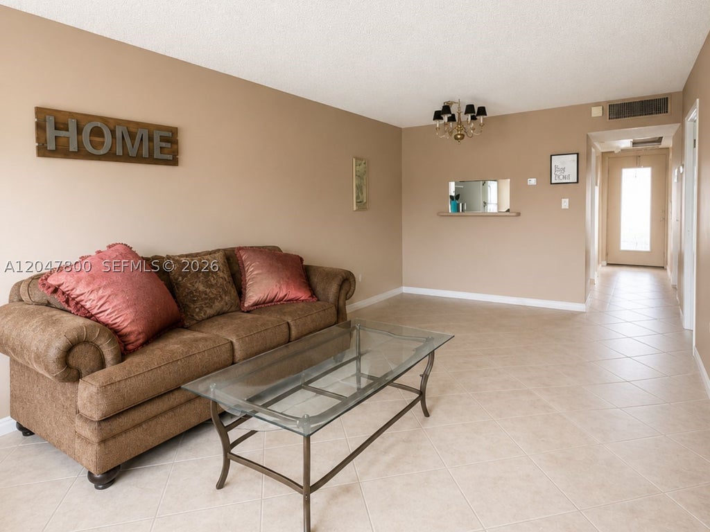 Photo of 4700 NW 35th St #411, Lauderdale Lakes, FL 33319 (MLS # A12047800)