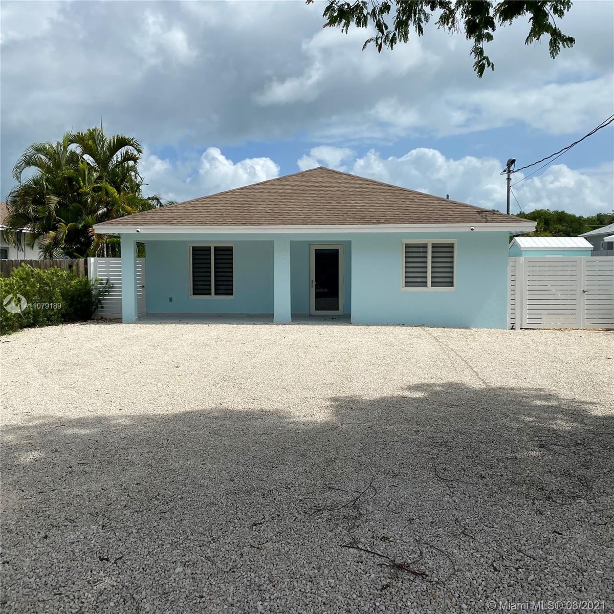 Exceptional and rare opportunity is available on Key Largos Adam's Waterway! This 3 bedroom, 2 bath CBS home with 50 ft of concrete on Adam's Waterway. Amazing location with easy access to both the ocean & bay via the waterway. The open floor plan has remodeled kitchen, high ceilings, New fence, New Jacuzzi, New Hurricane impact windows and some interior furniture if wanted to be included in sale. Huge master bedroom with sliders looking towards the water, walk-in closet & large master bath with walk in shower. The fenced back yard offers plenty of shaded seating, ideal for grilling or just relax and watch the boats go by. The dock also has new davits to hoist your boat. X Flood Zone