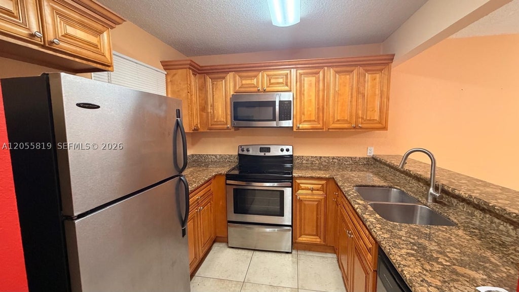 Photo of 1760 Windorah Way #H, West Palm Beach, FL 33411 (MLS # A12055819)