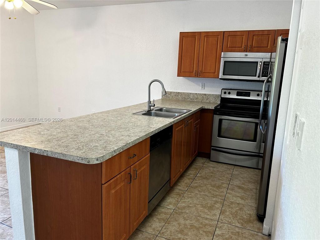 Photo of 4906 SW 141st Ave #4, Miramar, FL 33027 (MLS # A12014460)