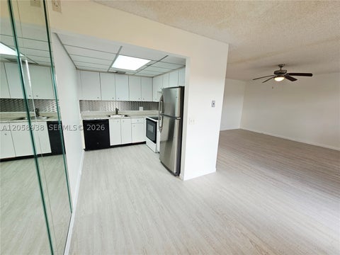 Photo of 13250 SW 7th Ct #402L, Pembroke Pines, FL 33027 (MLS # A12058938)