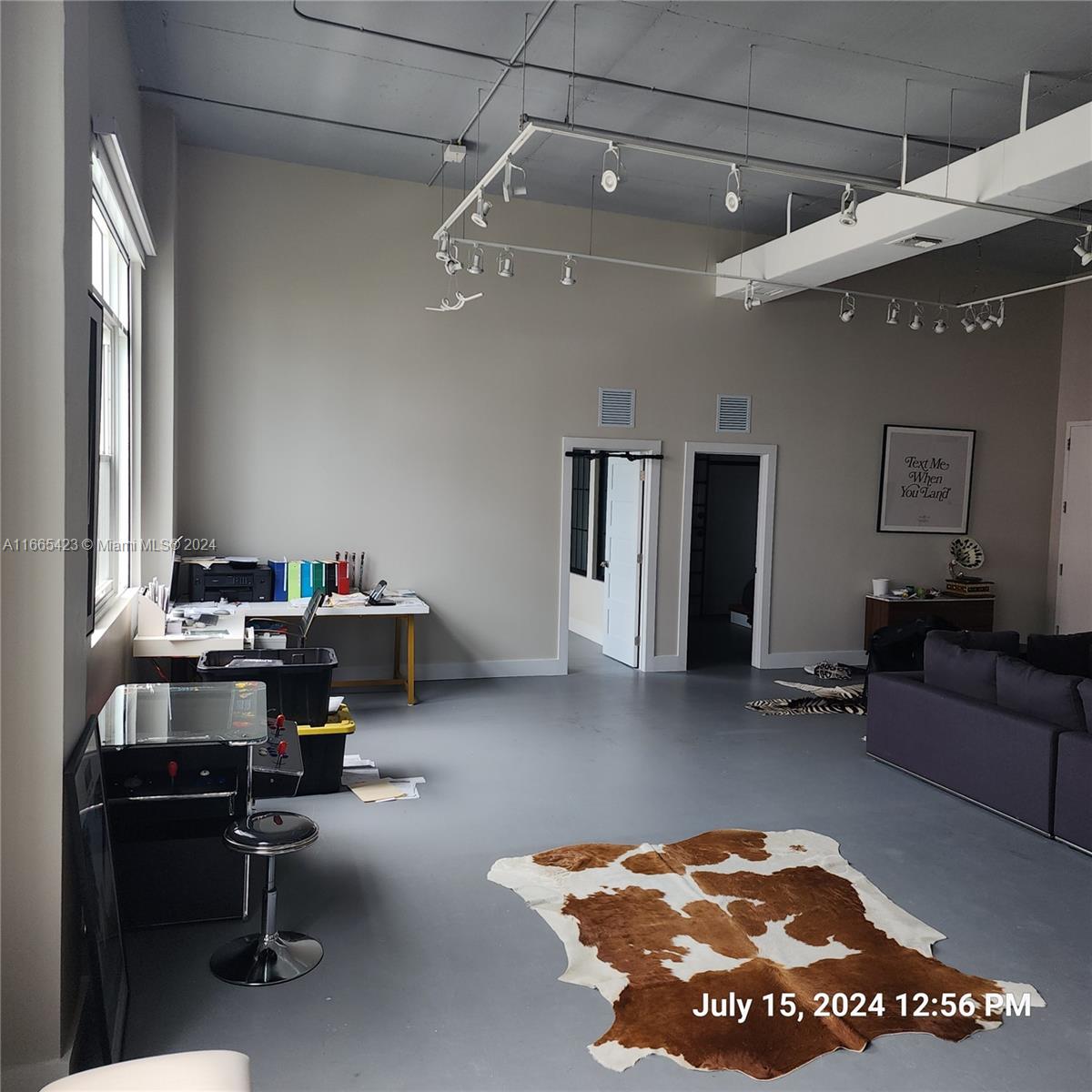 1463 SF industrial loft space in the heart of Wynwood to live and/or work from. The space has high ceilings, large windows, concrete floors and an open floor plan with 2 offices.