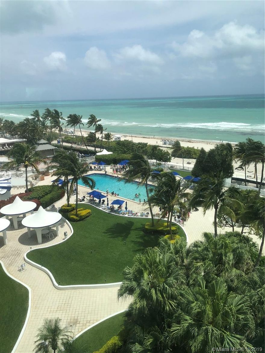 The ultimate best priced direct ocean view super renovated & remodeled Seacoast residence. Two bed 2 bath split floor plan with gorgeous porcelain floors thru out, superior quality fixtures, all high impact glass, knock out kitchen w/hi-end stainless steel appls, quartz counters, custom backsplash & lit cabinets. Elegant & contemporary Euro Master Bath with stone walk in shower. Central dehumidifier system and much more. Pet friendly. 30 day rentals allowed. Monthly Condo fee includes 1 covered assigned parking space,  water, sewer, garbage removal, hot water, air conditioning, expanded cable, all amenities, beach and pool service and reserves.