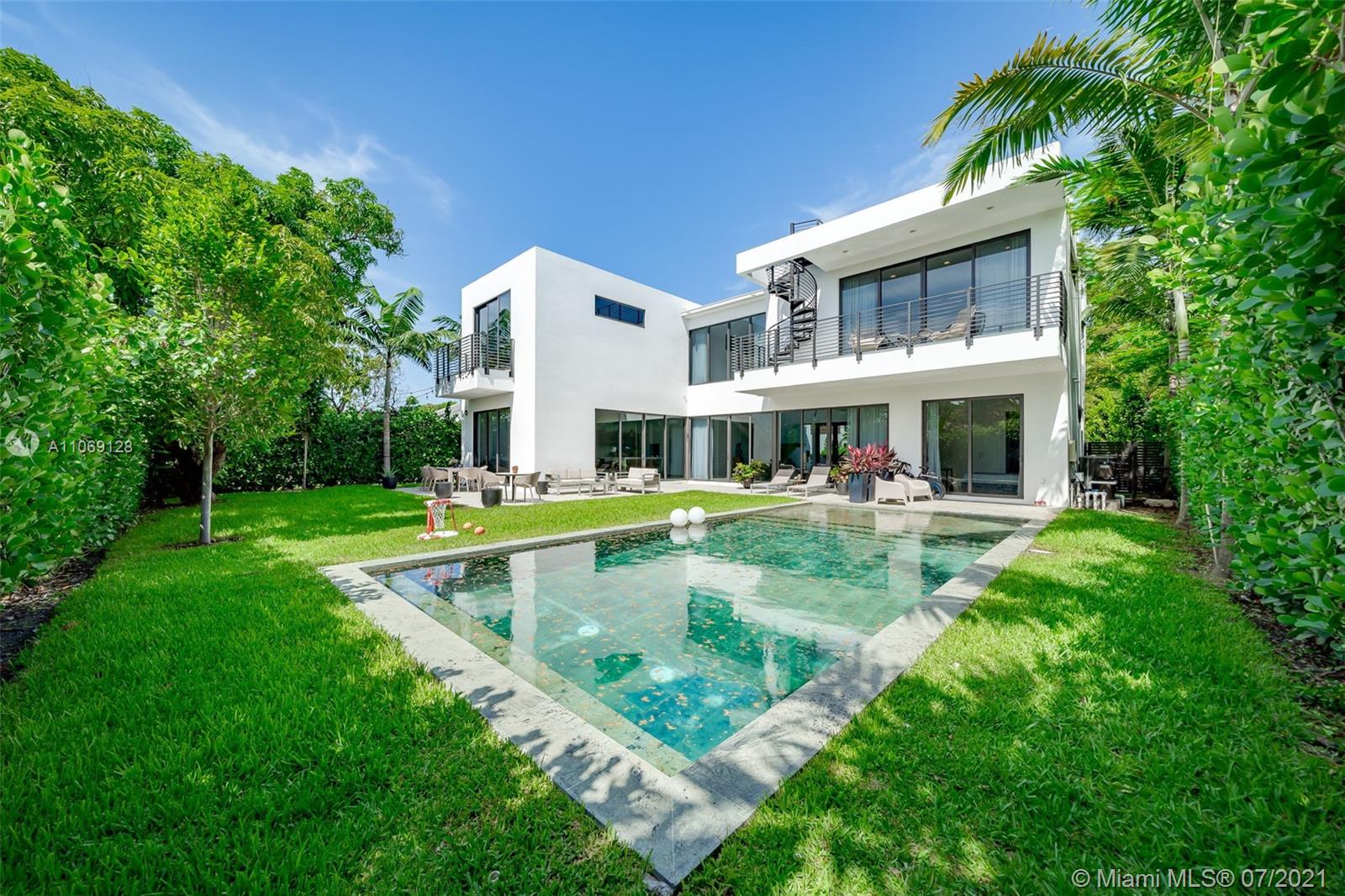 Be prepared to fall in Love with this stunning newly built modern home that greets you w/ high ceilings bathed in extraordinary natural light. Master suite has a luxurious bath, walk-in closet, and private terrace overlooking the pool, access to a private rooftop terrace. 5 large bedrooms with generous built-in closets and private terraces, 5.5 baths perfectly designed to maximize space & privacy, open concept blending the indoors & outdoors. Magnificent eat in kitchen is ornamented w/ quartz f stone & hardwood countertops. The Dining Room room opens to the outdoor terrace, perfect for seamless entertaining. Lush tropical landscaping, beautiful pool creating a Zen paradise. Located minutes away from schools, houses of worship, dining, best beaches, Lincoln Rd.