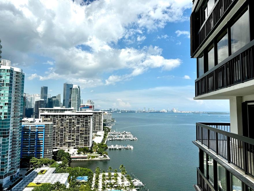 Brickell Bay Club 2 bed/2 bath unit with 1,100 liv. sq ft per county property appraiser plus enclosed balcony of approx. 140 sq ft per developer with a north-facing view. 1 assigned covered parking space. Maint. fee of $973.00 per mo. 2024 R.E. Taxes of $9,533.48. Amenities: 24-hour valet & security, pool, BBQ area, gym w/sauna & steam room, pickleball/tennis/racquetball courts, event room, children's playrooms, bicycle/scooter/kayak storage area, EV charging station, convenience store, and beauty salon. Owners are permitted two (2) dogs or cats under 15 lbs each, fish, birds and other domestic pets. Minimum six (6) month leases.