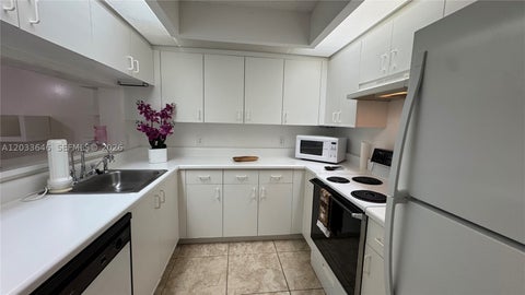Photo of 1200 SW 137th Ave #211E, Pembroke Pines, FL 33027 (MLS # A12033646)