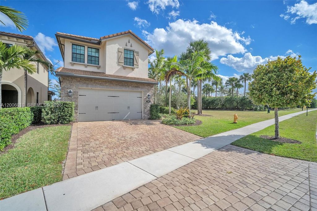 Photo of 865 SW 113th Ln, Pembroke Pines, FL 33025 (MLS # A12006010)