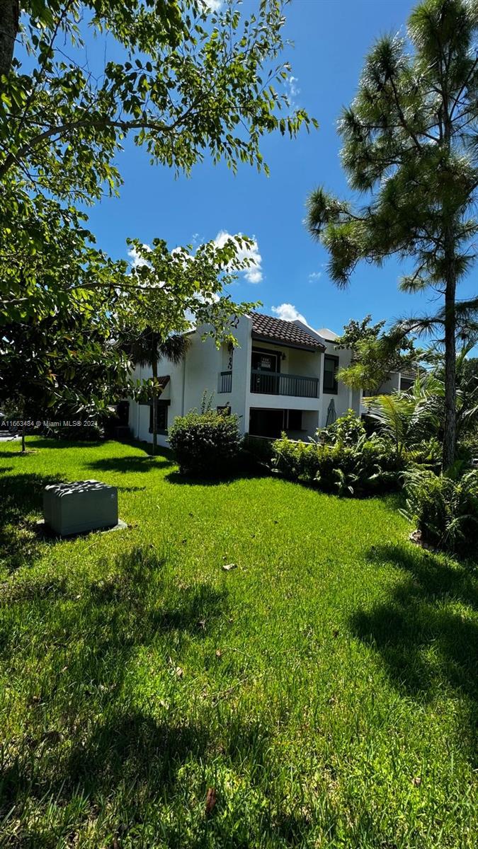 SPECTACULAR Corner Townhouse 3/2.5 with a view to the golf fields !!! a lot of light and nature. renovated kitchen with a marble countertop and NEW stainless steel appliances, stairs, and bathrooms with generous 2050 ft living space. Master bedroom with a walking closet, Bathroom/double vanities, fantastic bathtub, and shower space. at the back of the house, a spacious patio with a working Jacuzzi is included for 5 persons. Cover garage with enough visitors parking, a special room for washer and dryer. Very Calm community don't miss the beautiful sunset at this beautiful property.