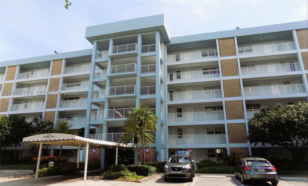 Photo of 3100 N Course Ln #502, Pompano Beach, FL 33069 (MLS # A12063728)