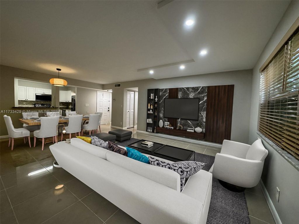 Photo of 12263 Royal Palm Blvd #4N, Coral Springs, FL 33065 (MLS # A11733429)