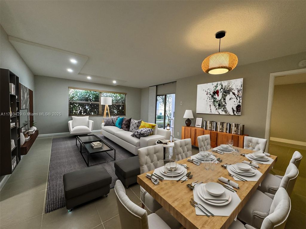 Photo of 12263 Royal Palm Blvd #4N, Coral Springs, FL 33065 (MLS # A11733429)