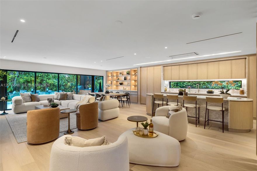 Just completed turnkey, one-story home located in the prestigious Bay Heights neighborhood of Coconut Grove. The home features a warm and earthy color palette with gentle curves and high-end finishes, including wall-covered wood panels and fine-crafted custom walls cabinetry. It offers 4 bedrooms and 4.5 bathrooms, Living Area 3,048 SF, lot size 8,625 SF, all with custom-made closets and premium plumbing fixtures. The open-concept kitchen flows directly into the backyard and is equipped with premium Miele and GE Monogram appliances. The exterior boasts a beige marble brick-style facade and a backyard designed for entertainment, featuring a pool and a covered summer kitchen. The residence is smart-home ready, featuring dimmer switches, a base security system, and seamless AC vents. The lot is fully enclosed with lush landscaping and an electric gated fence with a garage. Bay Heights is a private enclave of approximately 185 homes known for its quiet, walkable streets and central location. Easy access to major routes like US1, I-95 and Bayshore Dr. Minutes away from CocoWalk shops and restaurants, local parks, Mercy Hospital and top-rated schools. Bay Heights is known for 24/7 police patrol and proximity to Brickell and Downtown Miami. Best Deal in the market