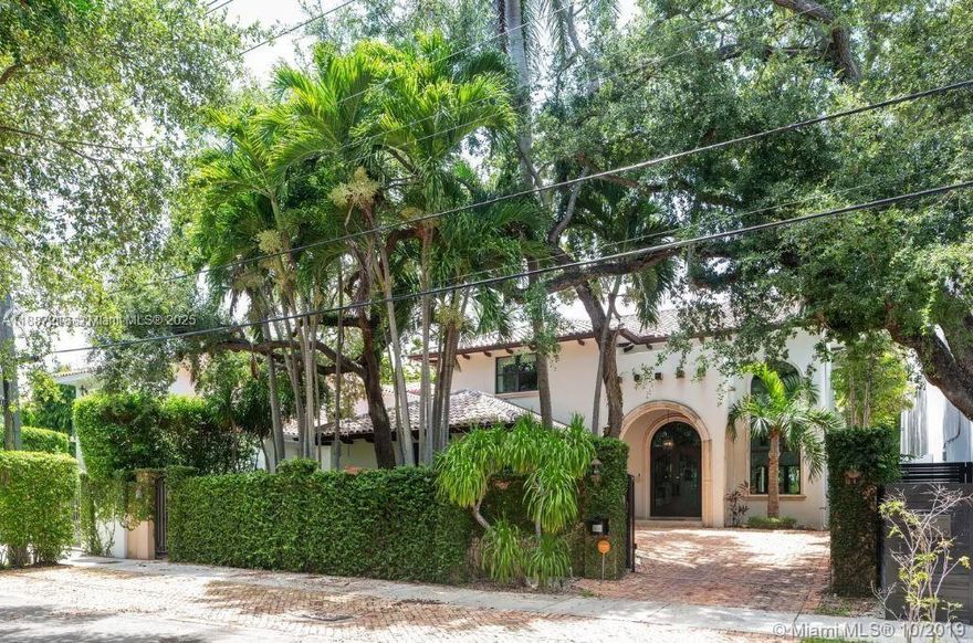 Furnished or unFurnished: Built in 2008. 4 Bedrooms & 4.5 Bathrooms, HIGH Ceilings Throughout. This Recently UPDATED (2019) Very Private Walled & Gated, Modern Mediterranean Home sits Quietly Tucked Away Towards the end of a Cul De Sac in Exclusive CENTER Grove. Truly close distances from all the Shops at Cocowalk, Marina, Parks. Soaring Ceilings in all Living areas, Top of Line Appliances, WOLF GAS RANGE. W/ New White Kitchen Cabinets, VERY Spacious Primary Suite with Built-in Closets, Covered Terraces and Balcony Upstairs and Downstairs, Very Generous Bedroom Spaces. 1st Floor Contains 1 Bedroom, 3 Bedrooms upstairs. Laundry Room w/ vanity, Pool w/ a Hot Tub, and a Wet Bar with Icemaker, Wine-cooler, mini-fridge. Rear fences and landscape has been updated.