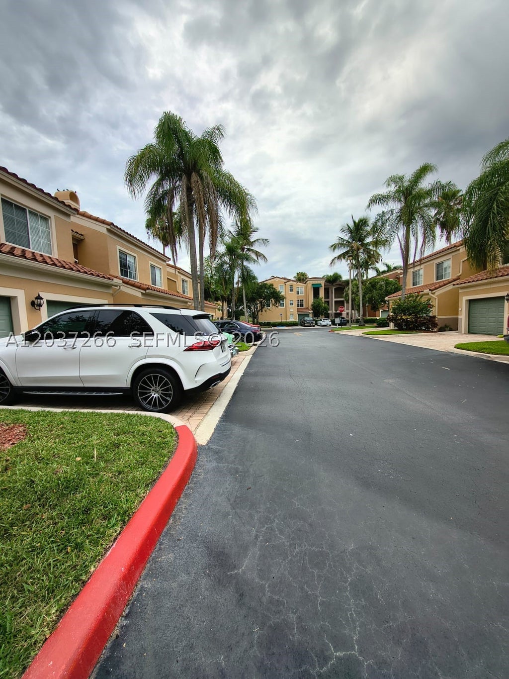 Photo of 11771 Saint Andrews Pl #104, Wellington, FL 33414 (MLS # A12037266)