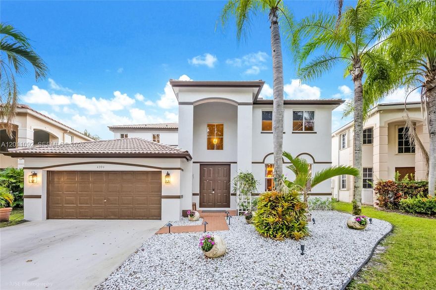 Are you searching for the rare combination that checks every box — gated community, 5 bedrooms, water frontage, a pool, and top-rated schools all in one? Welcome home to The Ridges in Weston.

This stunning two-story residence offers 5 bedrooms and 4 baths across a bright, open floor plan designed for how families actually live. The heart of the home flows seamlessly from generous gathering spaces to a large kitchen and out to your private backyard oasis — where a sparkling pool meets serene water views, a cozy gazebo, and zero rear neighbors. Whether it's a lazy Sunday swim or an evening with friends, this outdoor space delivers.

Inside, every detail invites you to settle in. Upstairs and down, the layout gives everyone room to breathe. And when the school bell rings, Weston's 100% A-rated schools are right around the corner, along with parks, dining, and everyday conveniences.

This is the one you've been waiting for.