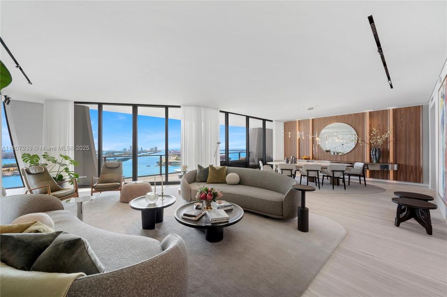 EXPERIENCE TIMELESS SOPHISTICATION WITH SUNRISE TO SUNSET VIEWS OF THE BAY & CITY FROM THIS PROFESSIONALLY CURATED HIGH-FLOOR MASTERPIECE! Foyer in Oak Millwork & Venetian Stucco Walls. Massive Glass Entry Door. South Corner 4 Beds + 5.5 Baths Residence. 4,600 Interior SF w/780 SF of Terraces. Lounge in Fendi Sofas & Dine w/Baxter Table & Custom Millwork. Wet Bar w/SubZero Wine Fridge. Primary Bedroom w/Marble Morning Bar & Custom Molteni Closet. Primary Bath in Carrara Marble w/Rainshower & Spa-like Bath Tub + Studio RODA Privacy Screen. Custom Italian Poliform Kitchen w/Onyx Marble Countertop & Appliances by Gaggenau + SubZero. Guest Rooms w/Molteni Mounted Cabinetry & Custom Bookcase. Crestron Home Shade Automation + Sonos. Dornbracht & Duravit Fixtures t/o. Laundry w/Ornare Cabinetry.