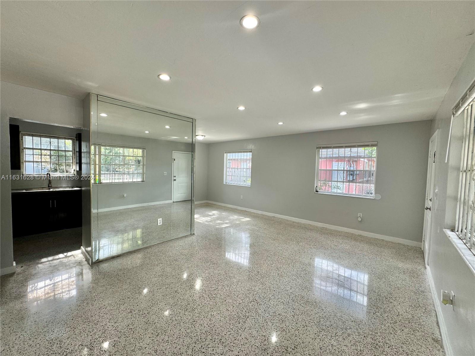 Gorgeous three bedroom and two bath! Complete restoration. Central a/c unit and washer and dryer! Dogs are accepted. Centrally located minutes to Wynwood, Design District, Midtown, and Downtown! 2 security deposits and the first month to move in.