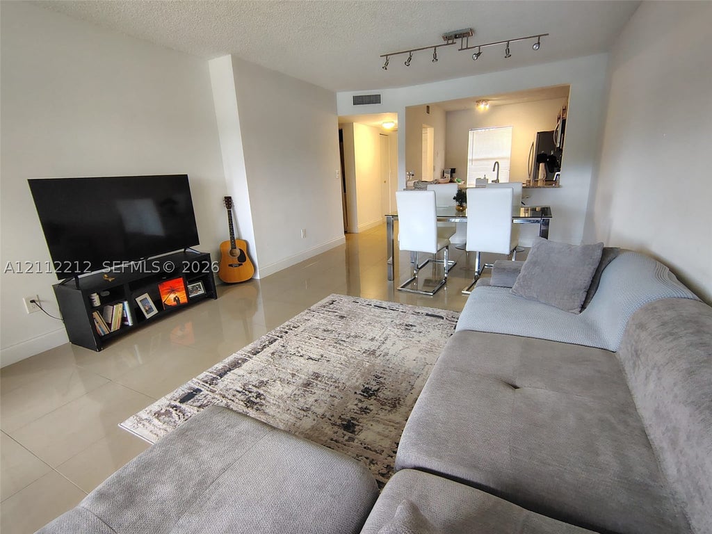 Photo of 2900 NW 42nd Avenue #304A, Coconut Creek, FL 33066 (MLS # A12112212)