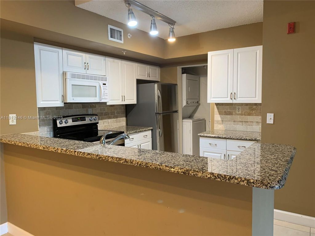 Photo of 2620 S University Dr #305, Davie, FL 33328 (MLS # A11812146)