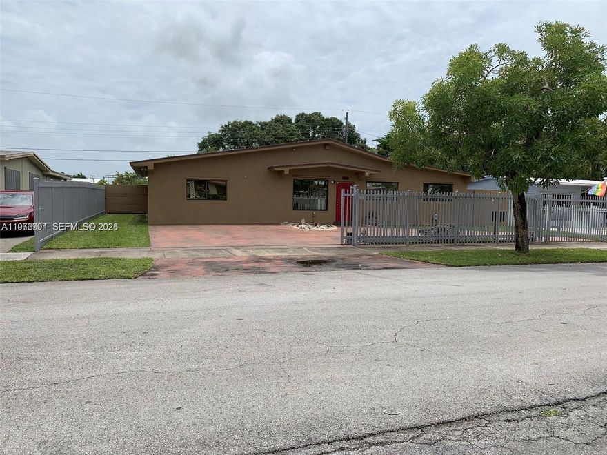 This beautiful Hialeah home is completely remodeled, with 4 bedrooms plus a den, a huge master suite with walk-in shower, and spacious built in closet, custom wall paneling,  modern remodeled kitchen with stainless steel appliances, big family room, new porcelain floors throughout, freshly painted, washer and dryer, surveillance system, impact doors and windows, gated circular driveway. The fenced backyard is very large, with room for a pool, full bathroom outdoors, a covered pergola and built-in outdoor kitchen, lighting and a large double shed. This is a beautiful home for entertainment, ready to move in, very central, in a great neighborhood, close to main expressways, restaurants and shopping centers. So many updates to list, and very well taken care of. A true must see!