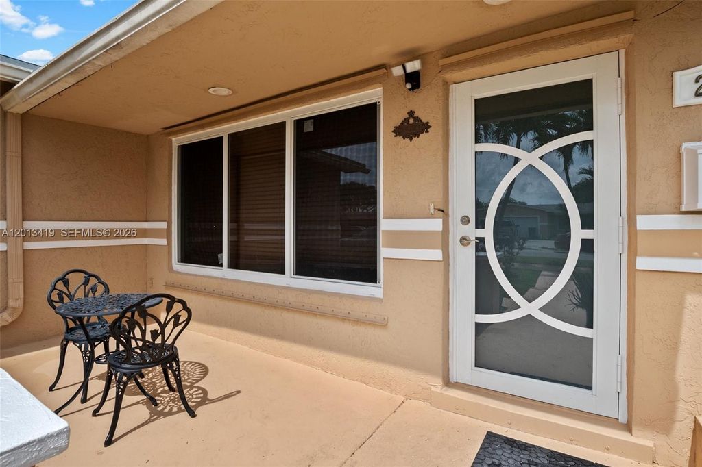 Photo of 2251 NW 87th Ave #2251, Pembroke Pines, FL 33024 (MLS # A12013419)