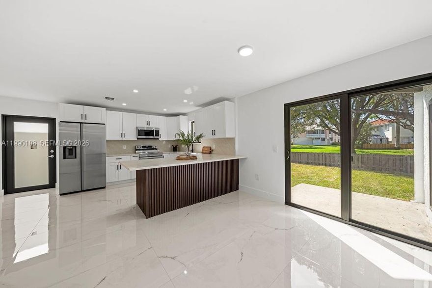 Step into this beautifully remodeled 3-bedroom, 2.5-bathroom home that perfectly blends modern style with everyday comfort. From the moment you arrive, you’ll appreciate the spacious layout and the convenience of a double-car garage. Natural lighting throughout to enjoy from every room.
Inside, the home has been thoughtfully updated with high end finishes, creating a bright and inviting atmosphere throughout. The open living areas flow seamlessly, ideal for both relaxing and entertaining. The kitchen is a standout feature, offering updated cabinetry, sleek countertops, and plenty of space to cook and gather.
The generously sized bedrooms provide comfort and privacy, while the primary suite offers a peaceful retreat with a private balcony with nice view to the lake and beautifully updated en-suite bathroom. The additional bathrooms have also been tastefully remodeled, adding to the home’s move-in-ready appeal.
Whether you’re hosting guests or enjoying a quiet evening at home, this property offers the perfect balance of style, functionality, and convenience. The backyard provides ample space for outdoor enjoyment, big enough for a future pool.                 
This property offers a very long trail along side the lake, perfect for kids to play and adults to walk or run.
Don’t miss the opportunity to make this stunning home yours—schedule your showing today!