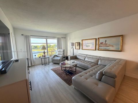 Photo of 2801 N Palm Aire Dr #405, Pompano Beach, FL 33069 (MLS # A11927095)