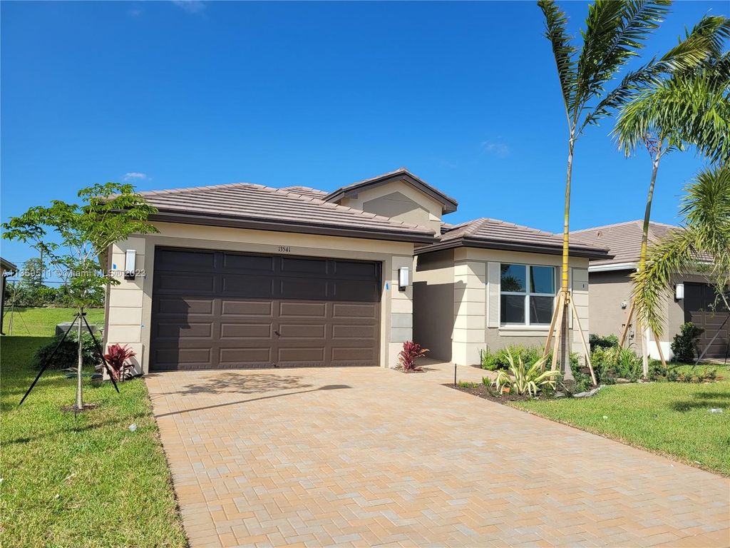 Photo of 13541 SW Oceanus Blvd, Port Saint Lucie, FL 34987 (MLS # A11359511)