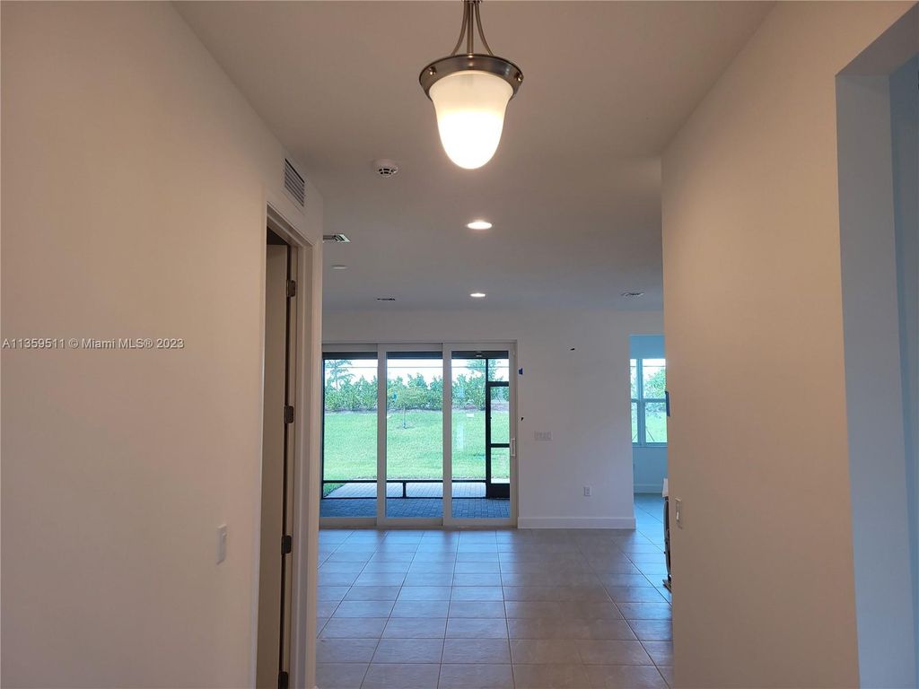 Photo of 13541 SW Oceanus Blvd, Port Saint Lucie, FL 34987 (MLS # A11359511)