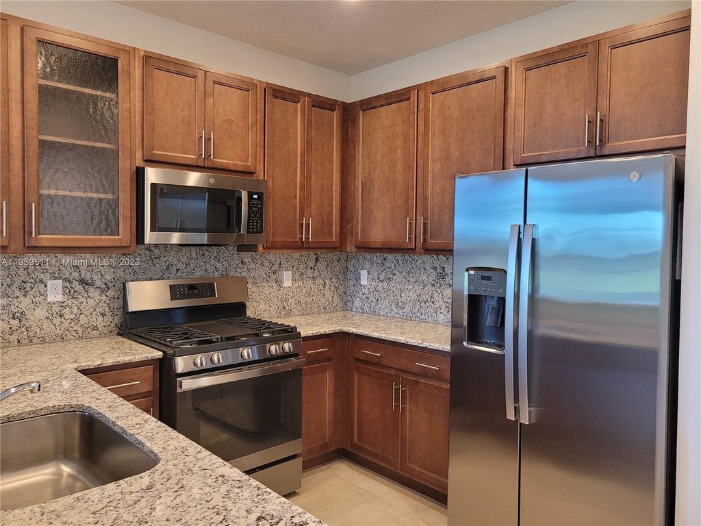 Photo of 13541 SW Oceanus Blvd, Port Saint Lucie, FL 34987 (MLS # A11359511)